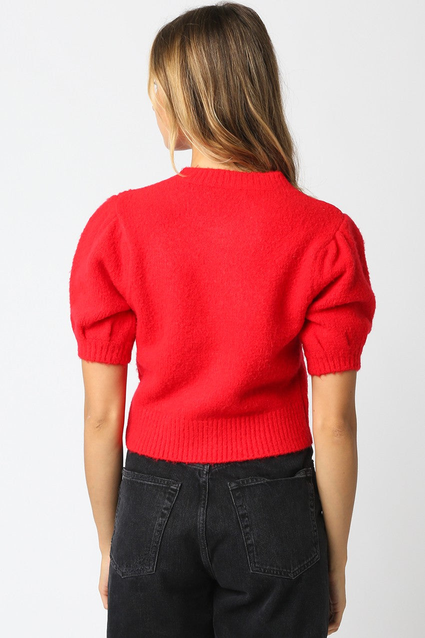 Monica's Red Sweater
